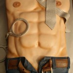 Shades of grey chiseled abs rock pecks jeans tie and cuffs male body erotic cake