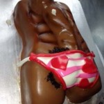 Lengthy-pecker-lays-over-pecks-balls-bulging-out-sexy-love-muscle-adult-cake
