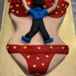Detroit-Michigan-Bachelor-Hanging-On-For-Dear-Life-Female-Torso-Cake
